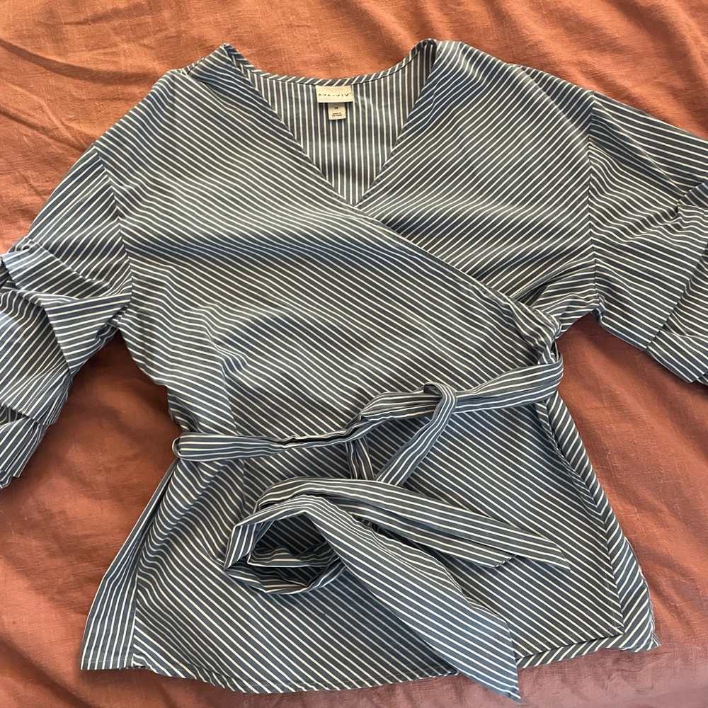 Wrap around blue striped blouse